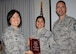 Col. Janette Thode, 340th FTG commander, and superintendent Chief Master Sgt. Jimmie Morris present the third quarter Senior NCO of the Quarter award to Master Sergeant Jennifer Robles, health services section chief, during the December 2017 mandatory unit training assembly. (U.S. Air Force photo)