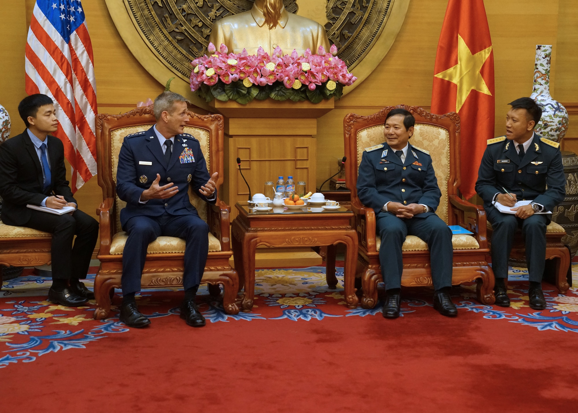 Gen. Terrence J. O’Shaughnessy, Pacific Air Forces commander, speaks with Senior Lt. Gen. Le Huy Vinh, Vietnamese Air Defense-Air Force (ADAF) commander, during an office call at ADAF Headquarters Hanoi, Vietnam, Dec. 14.