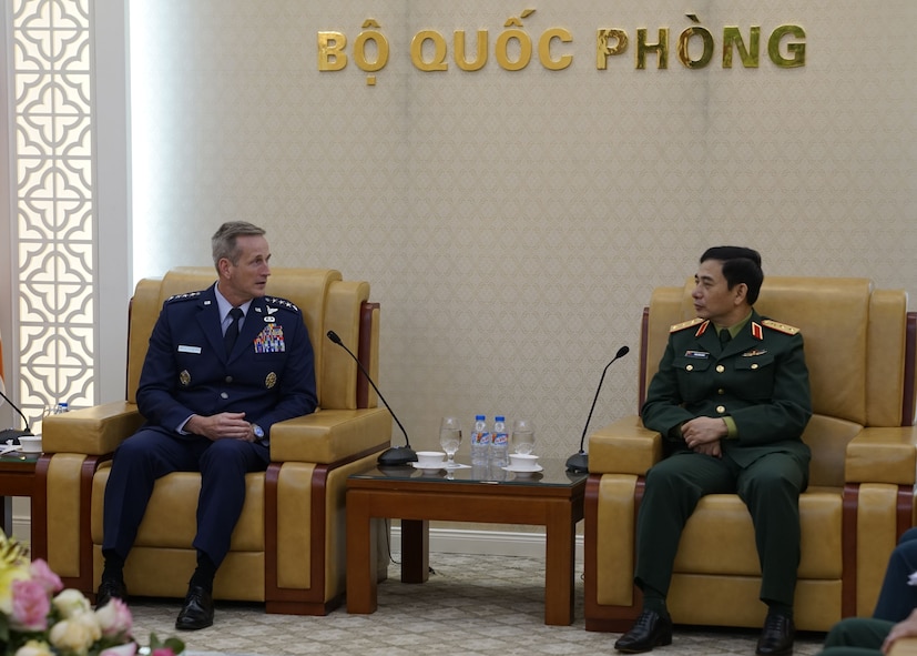 Gen. Terrence J. O’Shaughnessy, Pacific Air Forces commander, speaks with Senior Lt. Gen. Le Huy Vinh, Vietnamese Air Defense-Air Force (ADAF) commander, during an office call at ADAF Headquarters Hanoi, Vietnam, Dec. 14.