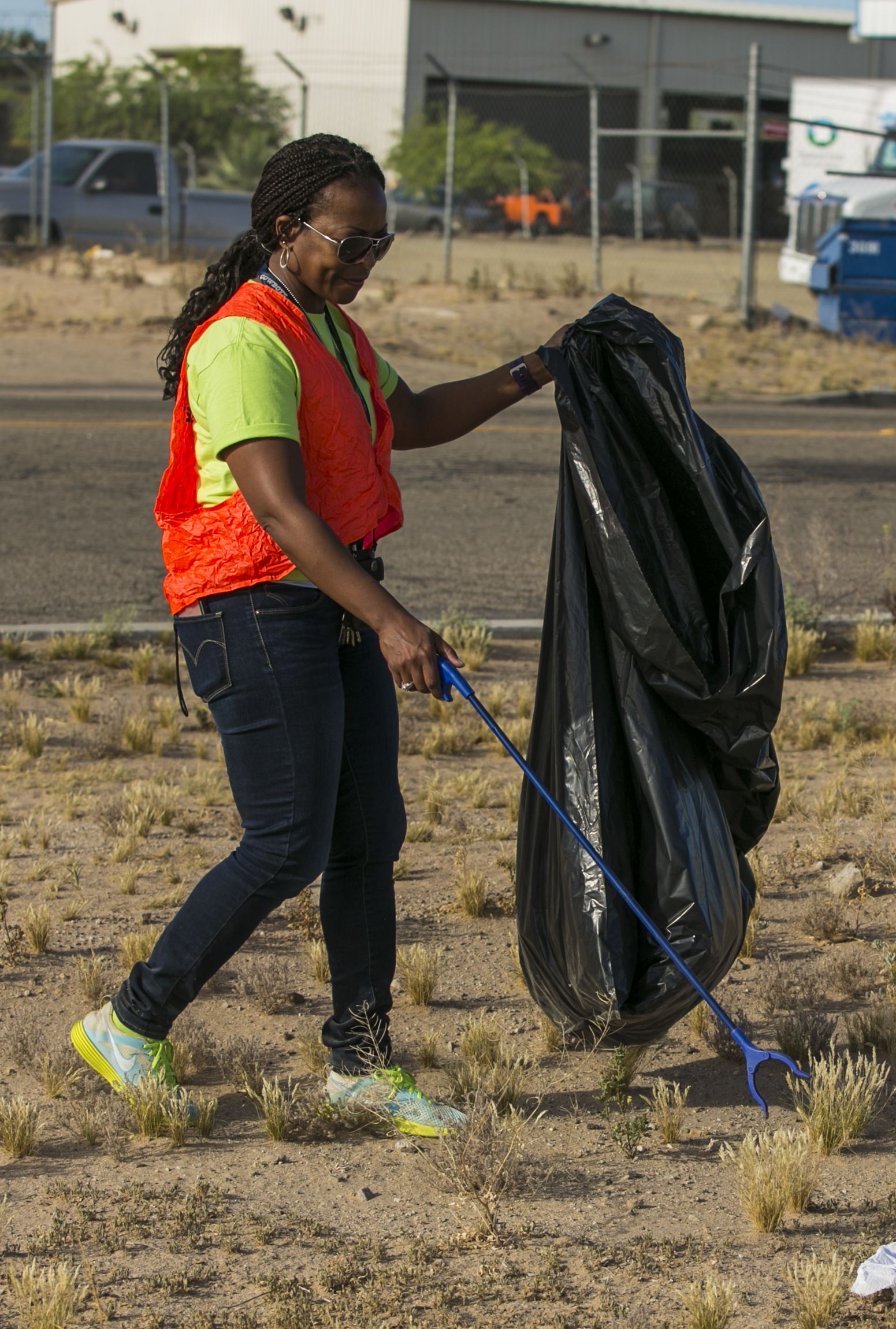 Volunteers from the Marine Corps Air Station Yuma Environmental Department participated in the roadside cleanup of Palo Verde Street, Monday, April 17, 2017 as a part of their Earth Week events. MCAS Yuma adopted this street over 17 years ago, and has helped keep it clean it each year. (U.S. Marine Corps photo taken by Lance Cpl. Isaac D. Martinez/Released)