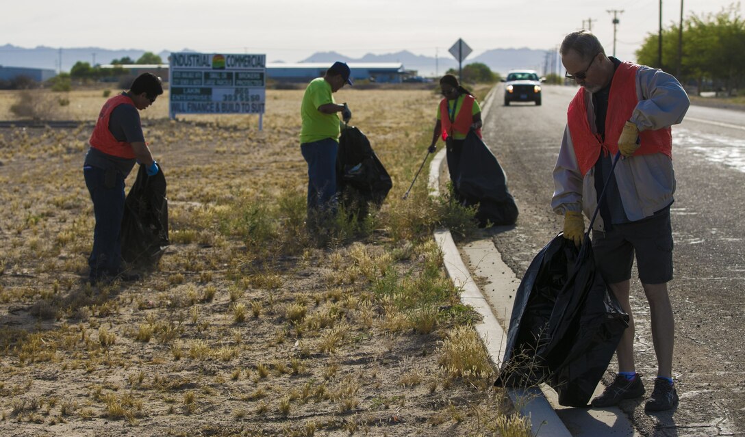 Volunteers from the Marine Corps Air Station Yuma Environmental Department participated in the roadside cleanup of Palo Verde Street, Monday, April 17, 2017 as a part of their Earth Week events. MCAS Yuma adopted this street over 17 years ago, and has helped keep it clean it each year. (U.S. Marine Corps photo taken by Lance Cpl. Isaac D. Martinez/Released)