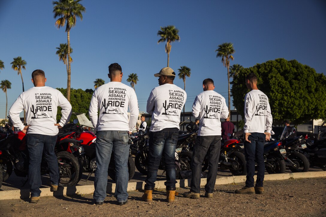 Service members, veterans, retirees and local law enforcement personnel gather in front of the Marine Corps Air Station Yuma parade deck during the 5th Annual Sexual Assault Awareness and Response Motorcycle Ride at Marine Corps Air Station Yuma, Ariz., Thursday, April 6, 2017. The motorcycle ride promotes Sexual Assault Awareness Month, raises awareness of the Sexual Assault Prevention and Response (SAPR) Program, and its resources available at MCAS Yuma. The event also supports Amberly’s Place, an organization that provides services to victims and their families. (U.S. Marine Corps photo taken by Lance Cpl. Christian Cachola)