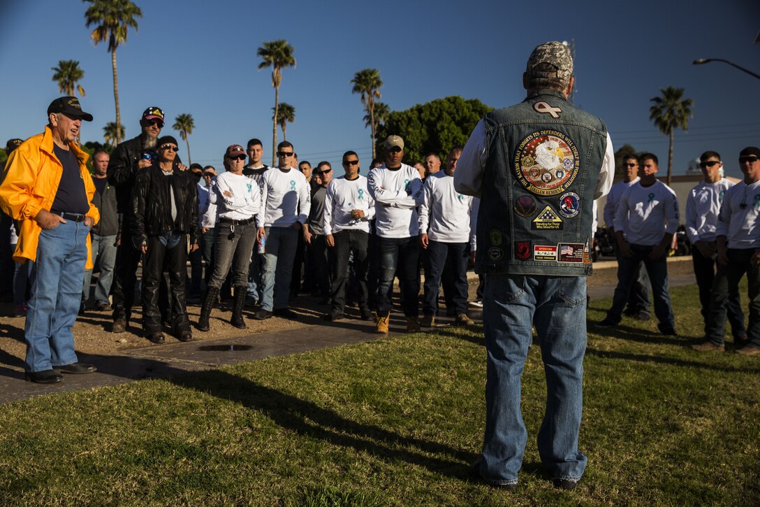 Service members, veterans, retirees and local law enforcement personnel gather in front of the Marine Corps Air Station Yuma parade deck during the 5th Annual Sexual Assault Awareness and Response Motorcycle Ride at Marine Corps Air Station Yuma, Ariz., Thursday, April 6, 2017. The motorcycle ride promotes Sexual Assault Awareness Month, raises awareness of the Sexual Assault Prevention and Response (SAPR) Program, and its resources available at MCAS Yuma. The event also supports Amberly’s Place, an organization that provides services to victims and their families. (U.S. Marine Corps photo taken by Lance Cpl. Christian Cachola)