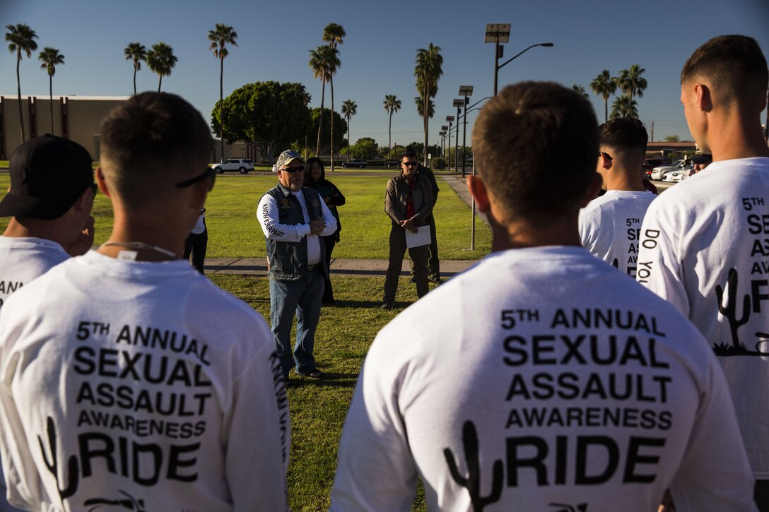 Service members, veterans, retirees and local law enforcement personnel gather in front of the Marine Corps Air Station Yuma parade deck during the 5th Annual Sexual Assault Awareness and Response Motorcycle Ride at Marine Corps Air Station Yuma, Ariz., Thursday, April 6, 2017. The motorcycle ride promotes Sexual Assault Awareness Month, raises awareness of the Sexual Assault Prevention and Response (SAPR) Program, and its resources available at MCAS Yuma. The event also supports Amberly’s Place, an organization that provides services to victims and their families. (U.S. Marine Corps photo taken by Lance Cpl. Christian Cachola)