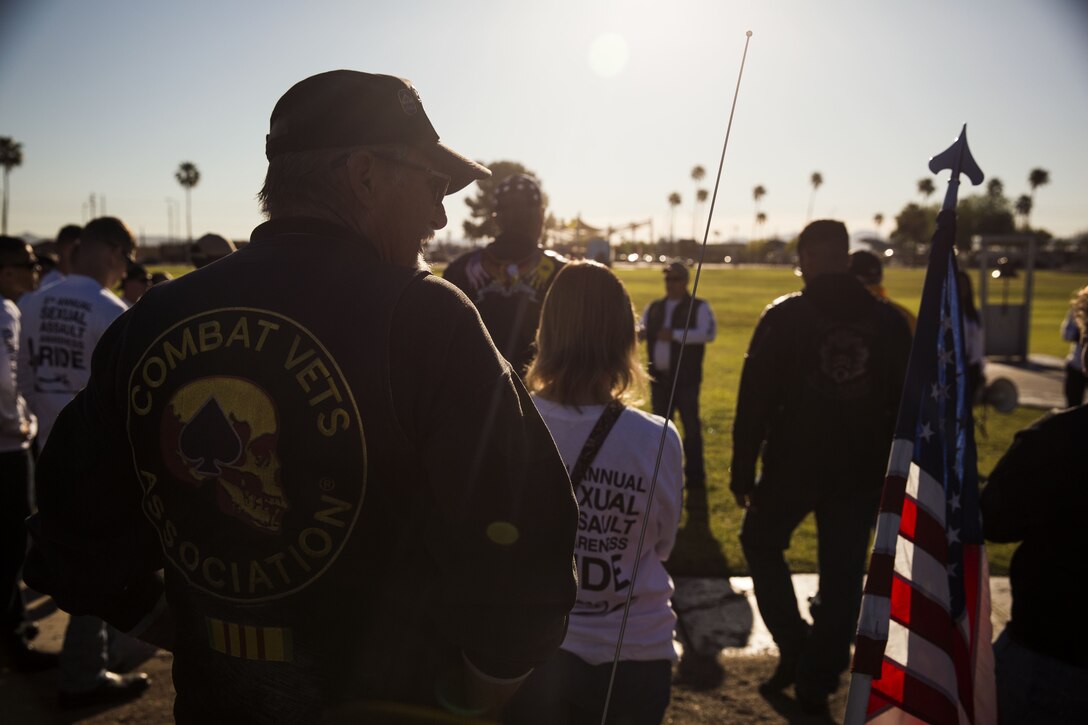 Service members, veterans, retirees and local law enforcement personnel gather in front of the Marine Corps Air Station Yuma parade deck during the 5th Annual Sexual Assault Awareness and Response Motorcycle Ride at Marine Corps Air Station Yuma, Ariz., Thursday, April 6, 2017. The motorcycle ride promotes Sexual Assault Awareness Month, raises awareness of the Sexual Assault Prevention and Response (SAPR) Program, and its resources available at MCAS Yuma. The event also supports Amberly’s Place, an organization that provides services to victims and their families. (U.S. Marine Corps photo taken by Lance Cpl. Christian Cachola)