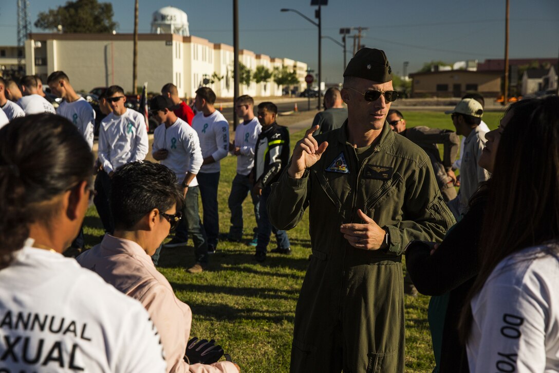 U.S. Marine Corps Lt. Col. Dane Howell, the Marine Corps Air Station Yuma operations officer, completes his opening remarks during the 5th Annual Sexual Assault Awareness and Response Motorcycle Ride at Marine Corps Air Station Yuma, Ariz., Thursday, April 6, 2017. The motorcycle ride promotes Sexual Assault Awareness Month, raises awareness of the Sexual Assault Prevention and Response (SAPR) Program, and its resources available at MCAS Yuma. The event also supports Amberly’s Place, an organization that provides services to victims and their families. (U.S. Marine Corps photo taken by Lance Cpl. Christian Cachola)