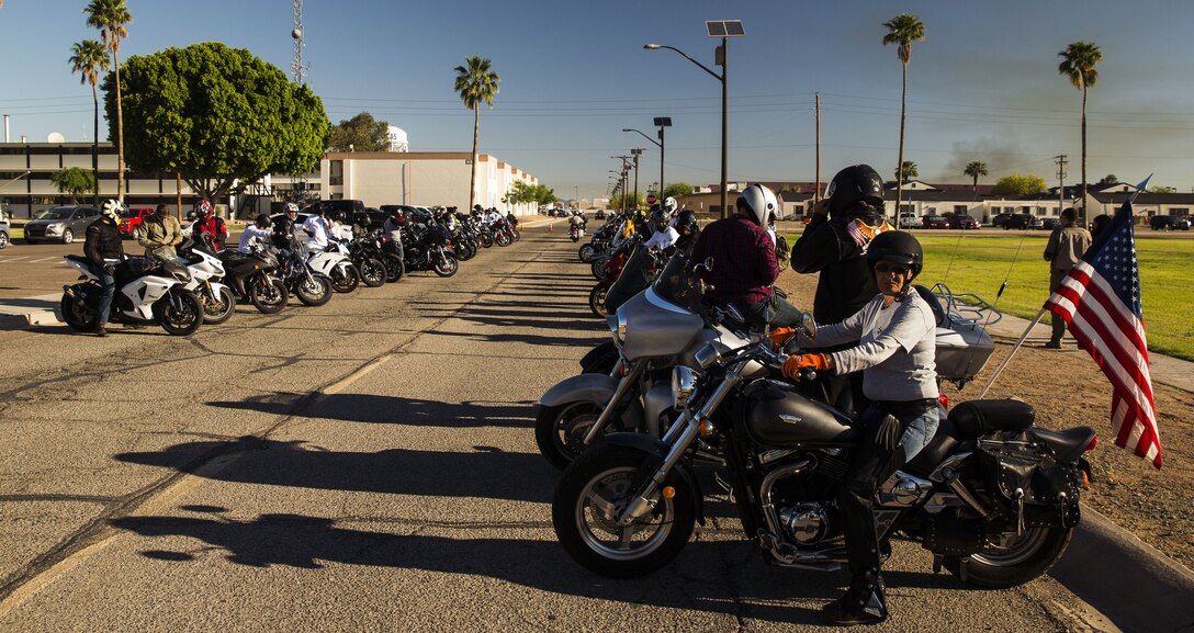 Service members, veterans, retirees and local law enforcement personnel prepare their vehicles during the 5th Annual Sexual Assault Awareness and Response Motorcycle Ride at Marine Corps Air Station Yuma, Ariz., Thursday, April 6, 2017. The motorcycle ride promotes Sexual Assault Awareness Month, raises awareness of the Sexual Assault Prevention and Response (SAPR) Program, and its resources available at MCAS Yuma. The event also supports Amberly’s Place, an organization that provides services to victims and their families. (U.S. Marine Corps photo taken by Lance Cpl. Christian Cachola)