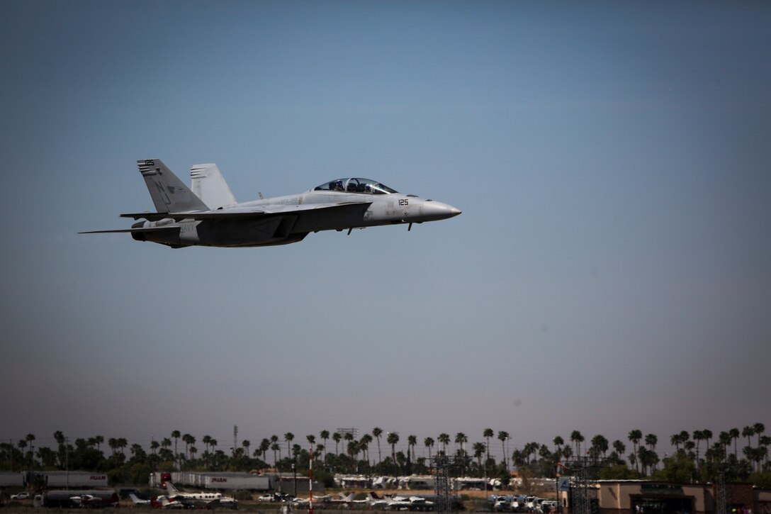 A U.S. Navy F/A-18E Super Hornet with Strike Fighter Squadron 122 (VFA-122) performs a tactical demonstration, showcasing the aircraft's high speed manuverability and low speed handling characteristics, as part of the 2017 Yuma Airshow at Marine Corps Air Station Yuma, Ariz., Saturday, March 18, 2017. (U.S. Marine Corps photo taken by Sgt. Travis Gershaneck)
