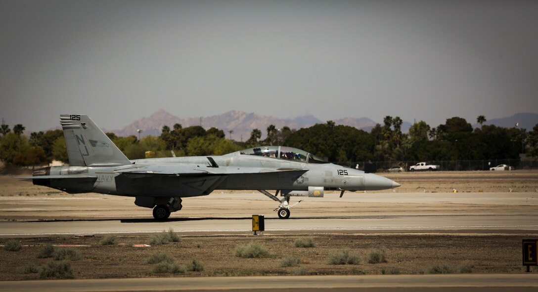 A U.S. Navy F/A-18E Super Hornet with Strike Fighter Squadron 122 (VFA-122) concludes a tactical demonstration, which showcased the aircraft's high speed manuverability and low speed handling characteristics, as part of the 2017 Yuma Airshow at Marine Corps Air Station Yuma, Ariz., Saturday, March 18, 2017. (U.S. Marine Corps photo taken by Sgt. Travis Gershaneck)