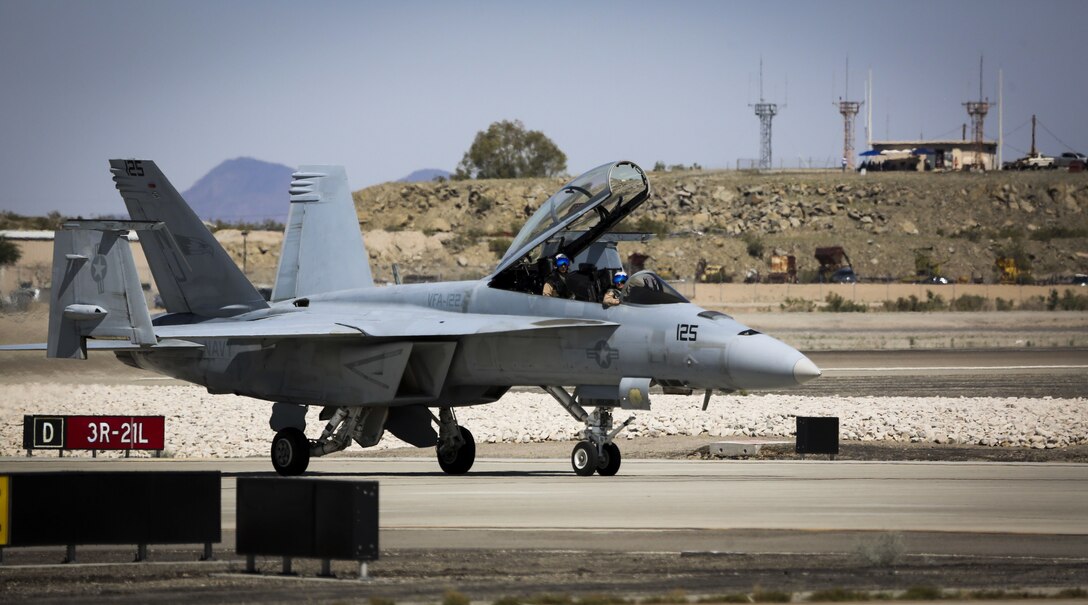 A U.S. Navy F/A-18E Super Hornet with Strike Fighter Squadron 122 (VFA-122) concludes a tactical demonstration, which showcased the aircraft's high speed manuverability and low speed handling characteristics, as part of the 2017 Yuma Airshow at Marine Corps Air Station Yuma, Ariz., Saturday, March 18, 2017. (U.S. Marine Corps photo taken by Sgt. Travis Gershaneck)