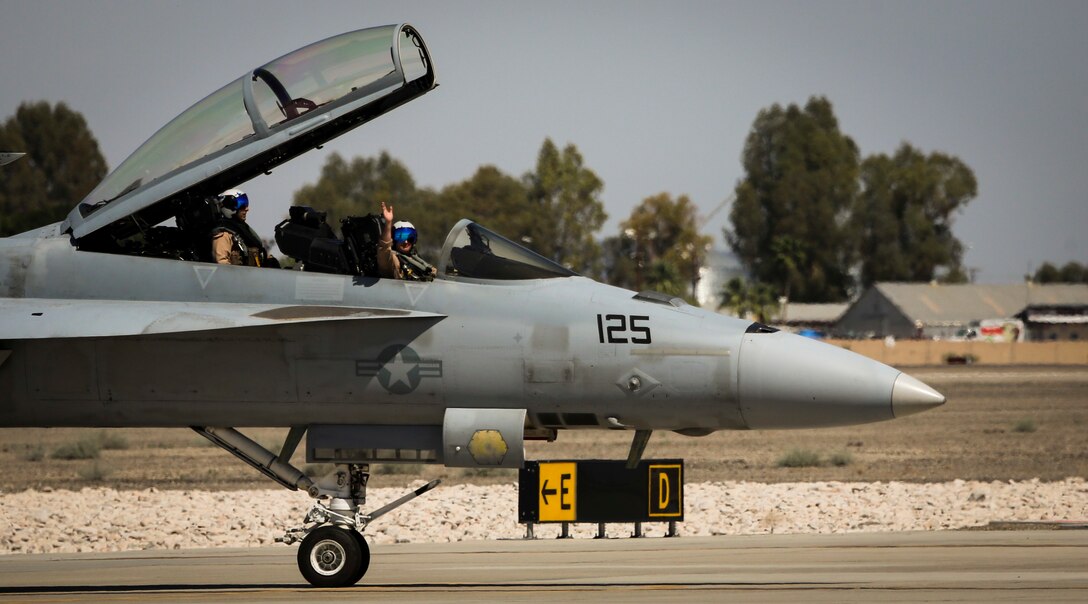 A U.S. Navy F/A-18E Super Hornet with Strike Fighter Squadron 122 (VFA-122) concludes a tactical demonstration, which showcased the aircraft's high speed manuverability and low speed handling characteristics, as part of the 2017 Yuma Airshow at Marine Corps Air Station Yuma, Ariz., Saturday, March 18, 2017. (U.S. Marine Corps photo taken by Sgt. Travis Gershaneck)