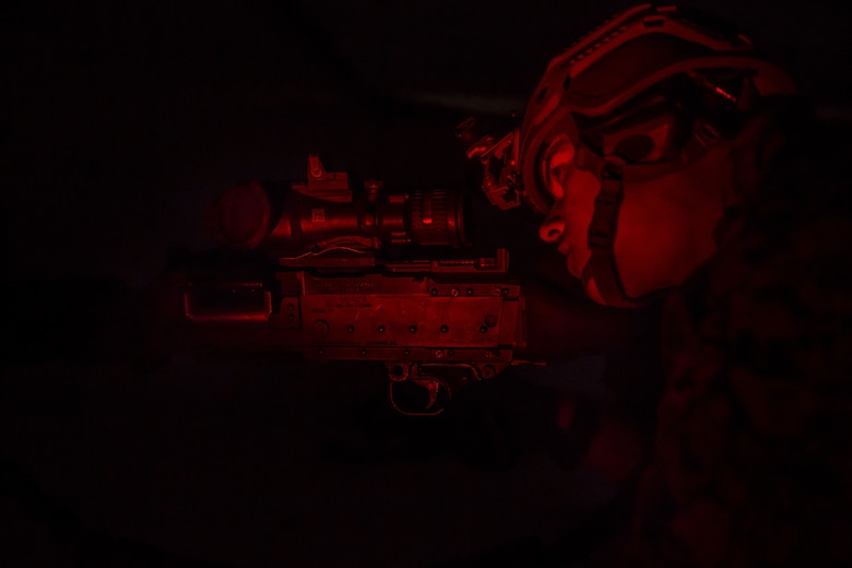 A Marine with 2nd Reconnaissance Battalion posts security with an M240b medium machine gun during a raid exercise as part of pre-deployment training at Fort Stewart, Ga., Dec. 6, 2017. Marines carried out the raid following their reconnaissance and surveillance exercises to emulate scenarios they may encounter with future operations. (U.S. Marine Corps photo by Lance Cpl. Taylor W. Cooper)
