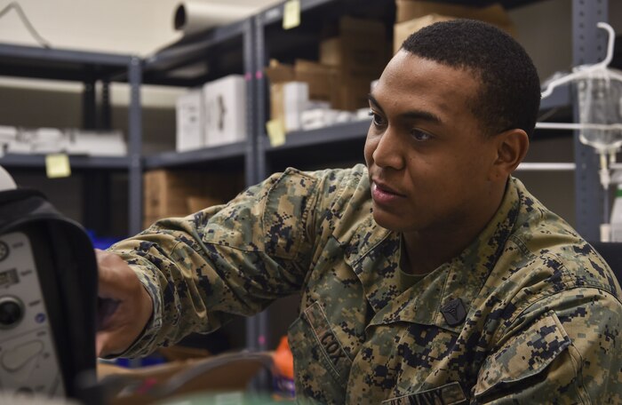 U.S. Navy Hospitalman 2nd Class Antwon Cox, 4th Medical Logistics Company, tests an electrocardiogram at Joint Base Charleston, S.C., Dec. 12, 2017.