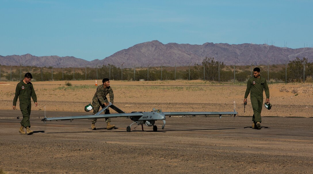U.S. Marines with Marine Unmanned Aerial Vehicle Squadron 1 (VMU-1) take the RQ-7B "Shadow" back to the hangar, after its final landing March 9, 2017 at Cannon Air Defense Complex at Marine Corps Air Station Yuma, Ariz.  VMU-1 will be replacing the RQ-7B "Shadow" with the RQ-21 "Blackjack," a more capable drone that uses less launch space than its predecessor. (U.S. Marine Corps photo by Lance Cpl. Isaac Martinez/Released)
