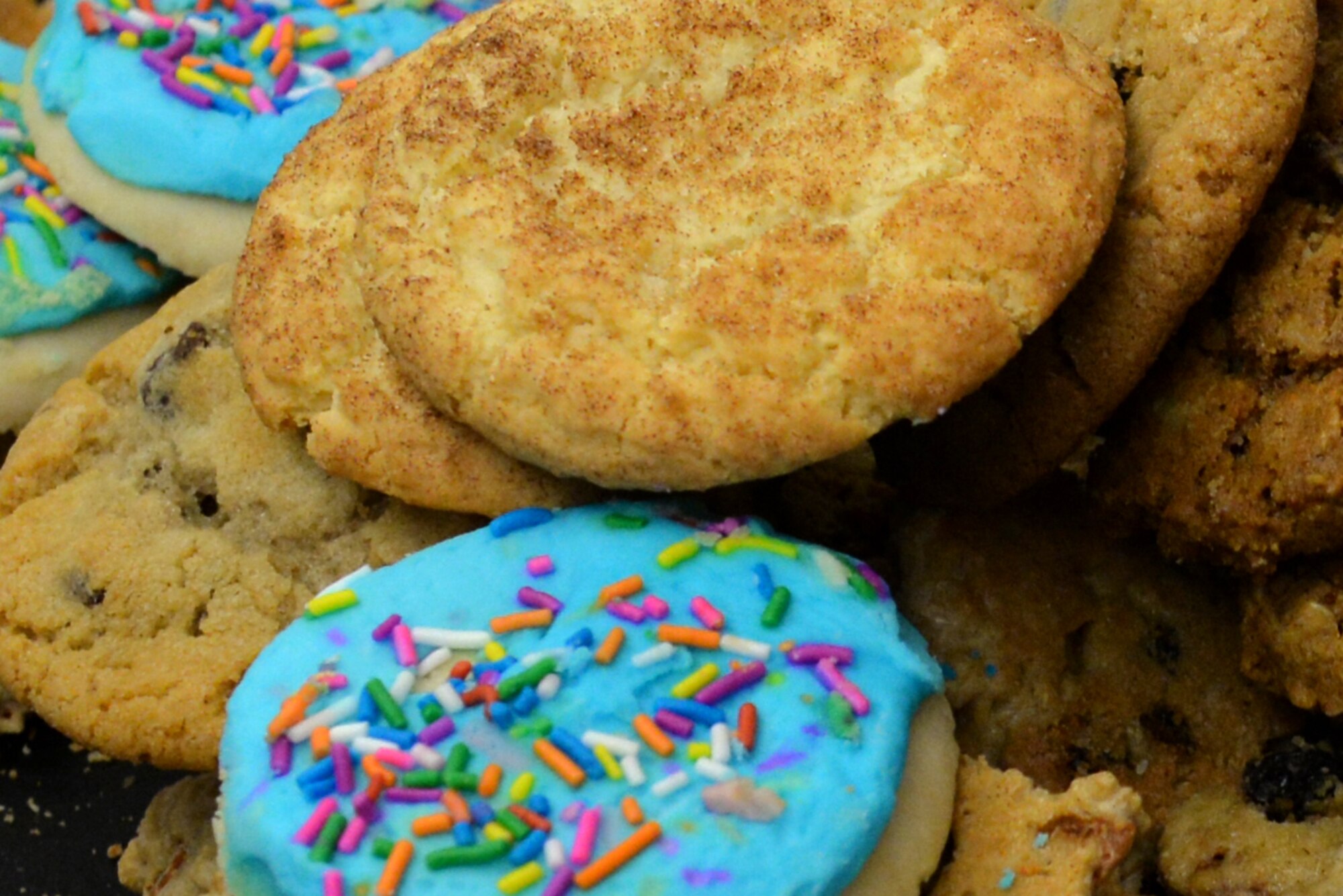 Cookies for holiday cheer are being prepared for distribution to Goodfellow trainees at the Taylor Chapel on Goodfellow Air Force Base, Texas, Dec. 20, 2017. More than 22,000 cookies that will be distributed in 1200 bags for students before they travel home for the holidays.