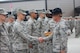 Tech. Sgt. James MacKay (currently Master Sergeant) presents the Airman's Coin to a graduating Airman in his flight during graduation ceremonies. MacKay led 13 flights during his time as a MTI. The Airman’s Coin Ceremony represents the culmination of 7 1/2 weeks of Basic Military Training. The coveted Airman's Coin is given to each graduating Airman. (U.S. Air Force photo).