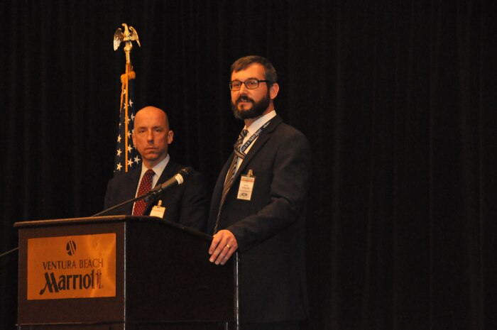 Naval Surface Warfare Center, Port Hueneme Division Chief of Contracts, Joel Walor (right), and Deputy Chief of Contracts, Nick DeSelle, provide insight regarding current and upcoming acquisition requirements, during the command’s Dec. 14 Industry Day held at Ventura Beach Marriott.