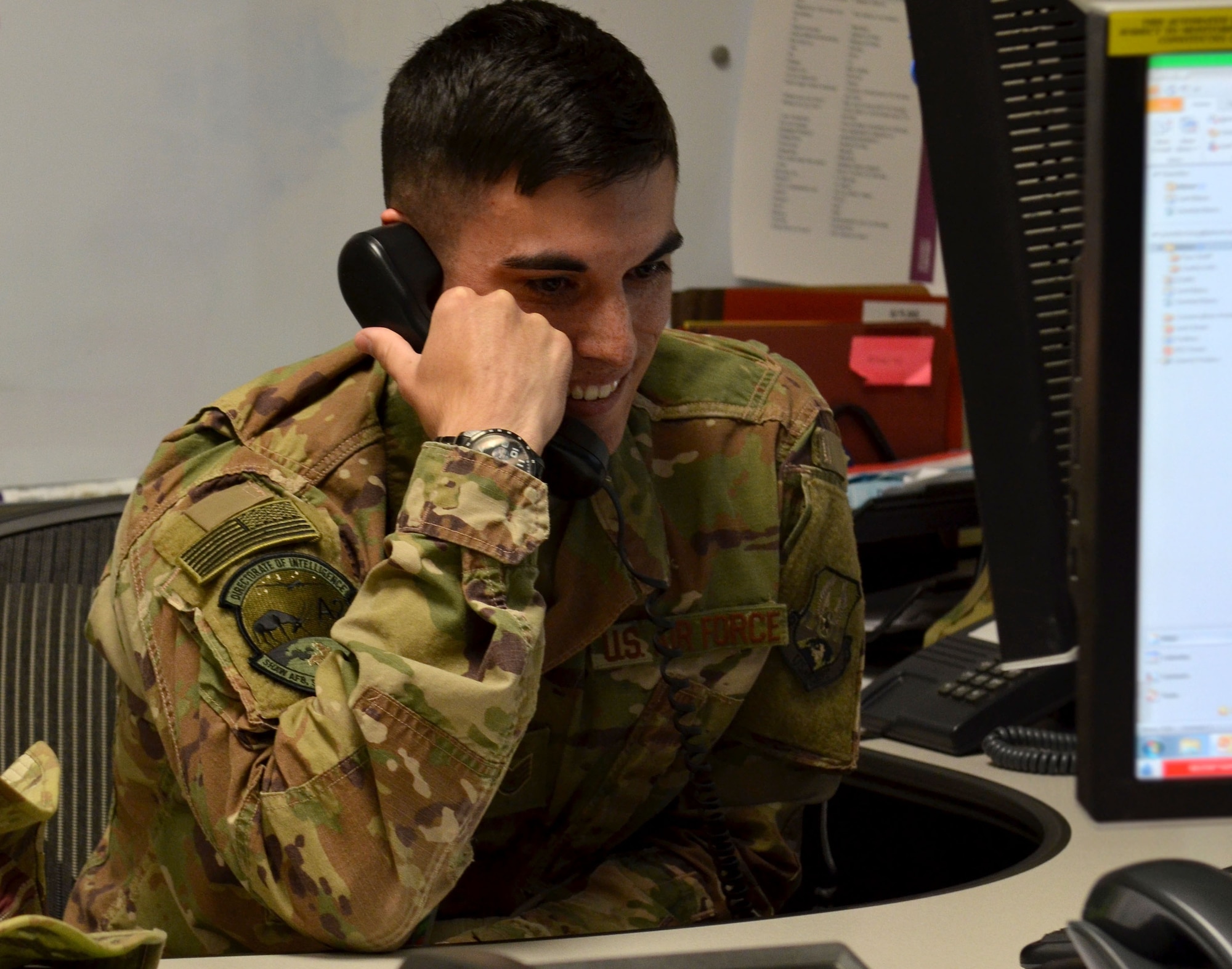 Secretary of the Air Force Heather Wilson notifies Staff Sgt. Anthony Segarra, U.S. Air Forces Central Command innovations solutions manager, of his selection to the Senior Leader Enlisted Commissioning Program-Active Duty Scholarship, Dec. 20, 2017.