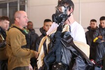 During the week-long training the platoons refined their skills in setup and breakdown of decontamination sites, decontamination of role players, and identification and detection of known agents in several scenarios including mass casaulty, radiation scenario and a subway scenario.  (Official USMC Photos by Staff Sgt. Santiago G. Colon Jr.)