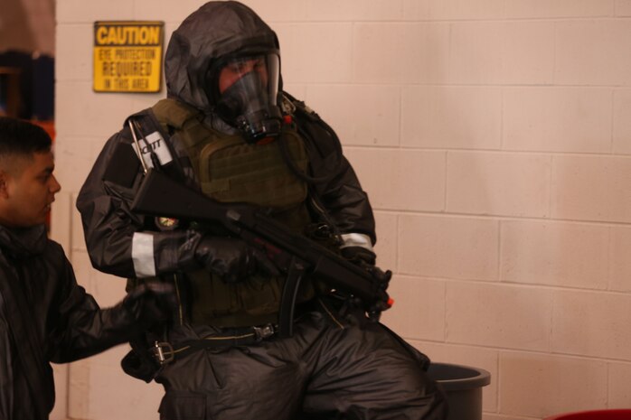 During the week-long training the platoons refined their skills in setup and breakdown of decontamination sites, decontamination of role players, and identification and detection of known agents in several scenarios including mass casaulty, radiation scenario and a subway scenario.  (Official USMC Photos by Staff Sgt. Santiago G. Colon Jr.)
