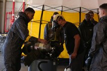 During the week-long training the platoons refined their skills in setup and breakdown of decontamination sites, decontamination of role players, and identification and detection of known agents in several scenarios including mass casaulty, radiation scenario and a subway scenario.  (Official USMC Photos by Staff Sgt. Santiago G. Colon Jr.)