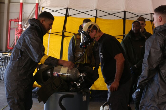 During the week-long training the platoons refined their skills in setup and breakdown of decontamination sites, decontamination of role players, and identification and detection of known agents in several scenarios including mass casaulty, radiation scenario and a subway scenario.  (Official USMC Photos by Staff Sgt. Santiago G. Colon Jr.)