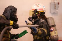 During the week-long training the platoons refined their skills in setup and breakdown of decontamination sites, decontamination of role players, and identification and detection of known agents in several scenarios including mass casaulty, radiation scenario and a subway scenario.  (Official USMC Photos by Staff Sgt. Santiago G. Colon Jr.)