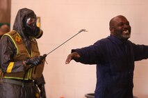 During the week-long training the platoons refined their skills in setup and breakdown of decontamination sites, decontamination of role players, and identification and detection of known agents in several scenarios including mass casaulty, radiation scenario and a subway scenario.  (Official USMC Photos by Staff Sgt. Santiago G. Colon Jr.)