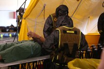 During the week-long training the platoons refined their skills in setup and breakdown of decontamination sites, decontamination of role players, and identification and detection of known agents in several scenarios including mass casaulty, radiation scenario and a subway scenario.  (Official USMC Photos by Staff Sgt. Santiago G. Colon Jr.)