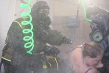 During the week-long training the platoons refined their skills in setup and breakdown of decontamination sites, decontamination of role players, and identification and detection of known agents in several scenarios including mass casaulty, radiation scenario and a subway scenario.  (Official USMC Photos by Staff Sgt. Santiago G. Colon Jr.)