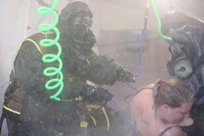 During the week-long training the platoons refined their skills in setup and breakdown of decontamination sites, decontamination of role players, and identification and detection of known agents in several scenarios including mass casaulty, radiation scenario and a subway scenario.  (Official USMC Photos by Staff Sgt. Santiago G. Colon Jr.)