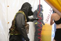 During the week-long training the platoons refined their skills in setup and breakdown of decontamination sites, decontamination of role players, and identification and detection of known agents in several scenarios including mass casaulty, radiation scenario and a subway scenario.  (Official USMC Photos by Staff Sgt. Santiago G. Colon Jr.)