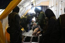 During the week-long training the platoons refined their skills in setup and breakdown of decontamination sites, decontamination of role players, and identification and detection of known agents in several scenarios including mass casaulty, radiation scenario and a subway scenario.  (Official USMC Photos by Staff Sgt. Santiago G. Colon Jr.)
