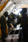During the week-long training the platoons refined their skills in setup and breakdown of decontamination sites, decontamination of role players, and identification and detection of known agents in several scenarios including mass casaulty, radiation scenario and a subway scenario.  (Official USMC Photos by Staff Sgt. Santiago G. Colon Jr.)