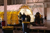 During the week-long training the platoons refined their skills in setup and breakdown of decontamination sites, decontamination of role players, and identification and detection of known agents in several scenarios including mass casaulty, radiation scenario and a subway scenario.  (Official USMC Photos by Staff Sgt. Santiago G. Colon Jr.)