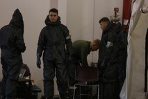 During the week-long training the platoons refined their skills in setup and breakdown of decontamination sites, decontamination of role players, and identification and detection of known agents in several scenarios including mass casaulty, radiation scenario and a subway scenario.  (Official USMC Photos by Staff Sgt. Santiago G. Colon Jr.)