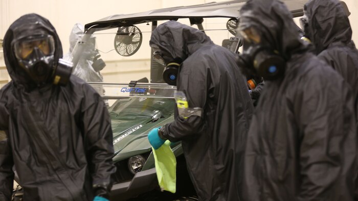 During the week-long training the platoons refined their skills in setup and breakdown of decontamination sites, decontamination of role players, and identification and detection of known agents in several scenarios including mass casaulty, radiation scenario and a subway scenario.  (Official USMC Photos by Staff Sgt. Santiago G. Colon Jr.)