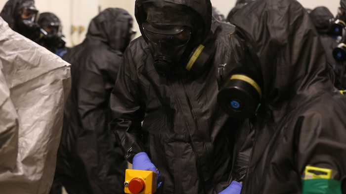 During the week-long training the platoons refined their skills in setup and breakdown of decontamination sites, decontamination of role players, and identification and detection of known agents in several scenarios including mass casaulty, radiation scenario and a subway scenario.  (Official USMC Photos by Staff Sgt. Santiago G. Colon Jr.)
