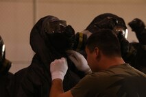 During the week-long training the platoons refined their skills in setup and breakdown of decontamination sites, decontamination of role players, and identification and detection of known agents in several scenarios including mass casaulty, radiation scenario and a subway scenario.  (Official USMC Photos by Staff Sgt. Santiago G. Colon Jr.)