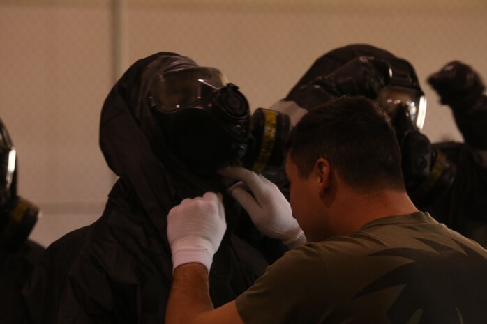 During the week-long training the platoons refined their skills in setup and breakdown of decontamination sites, decontamination of role players, and identification and detection of known agents in several scenarios including mass casaulty, radiation scenario and a subway scenario.  (Official USMC Photos by Staff Sgt. Santiago G. Colon Jr.)