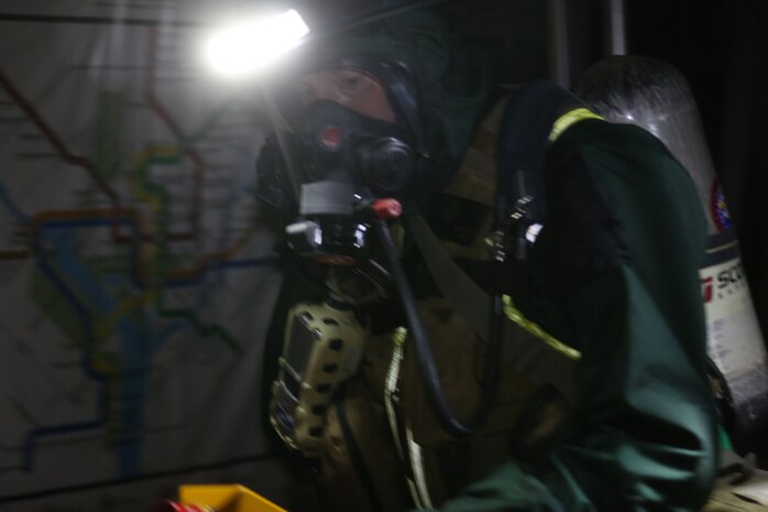 During the week-long training the platoons refined their skills in setup and breakdown of decontamination sites, decontamination of role players, and identification and detection of known agents in several scenarios including mass casaulty, radiation scenario and a subway scenario.  (Official USMC Photos by Staff Sgt. Santiago G. Colon Jr.)