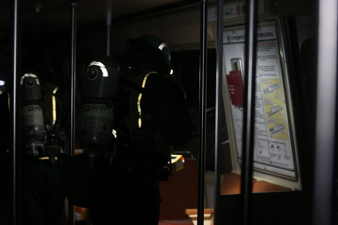 During the week-long training the platoons refined their skills in setup and breakdown of decontamination sites, decontamination of role players, and identification and detection of known agents in several scenarios including mass casaulty, radiation scenario and a subway scenario.  (Official USMC Photos by Staff Sgt. Santiago G. Colon Jr.)