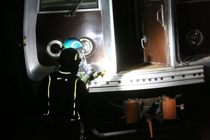 During the week-long training the platoons refined their skills in setup and breakdown of decontamination sites, decontamination of role players, and identification and detection of known agents in several scenarios including mass casaulty, radiation scenario and a subway scenario.  (Official USMC Photos by Staff Sgt. Santiago G. Colon Jr.)