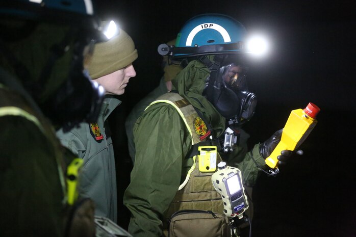 During the week-long training the platoons refined their skills in setup and breakdown of decontamination sites, decontamination of role players, and identification and detection of known agents in several scenarios including mass casaulty, radiation scenario and a subway scenario.  (Official USMC Photos by Staff Sgt. Santiago G. Colon Jr.)