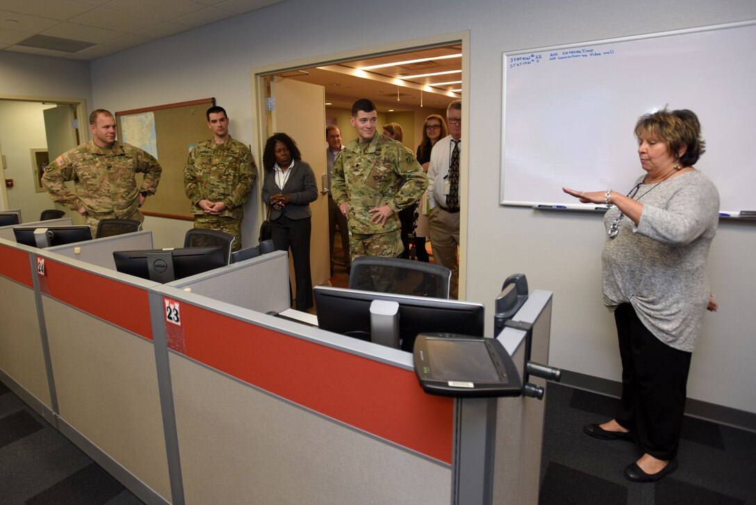 Dee Rivera (Right), U.S. Army Corps of Engineers Nashville District Emergency Management specialist, briefs Memphis District officials Dec. 19, 2017 on the capabilities of the Emergency Management Center at the Nashville District Headquarters in Nashville, Tenn. (USACE photo by Lee Roberts)