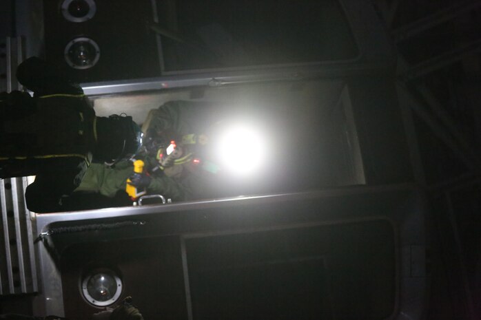 During the week-long training the platoons refined their skills in setup and breakdown of decontamination sites, decontamination of role players, and identification and detection of known agents in several scenarios including mass casaulty, radiation scenario and a subway scenario.  (Official USMC Photos by Staff Sgt. Santiago G. Colon Jr.)