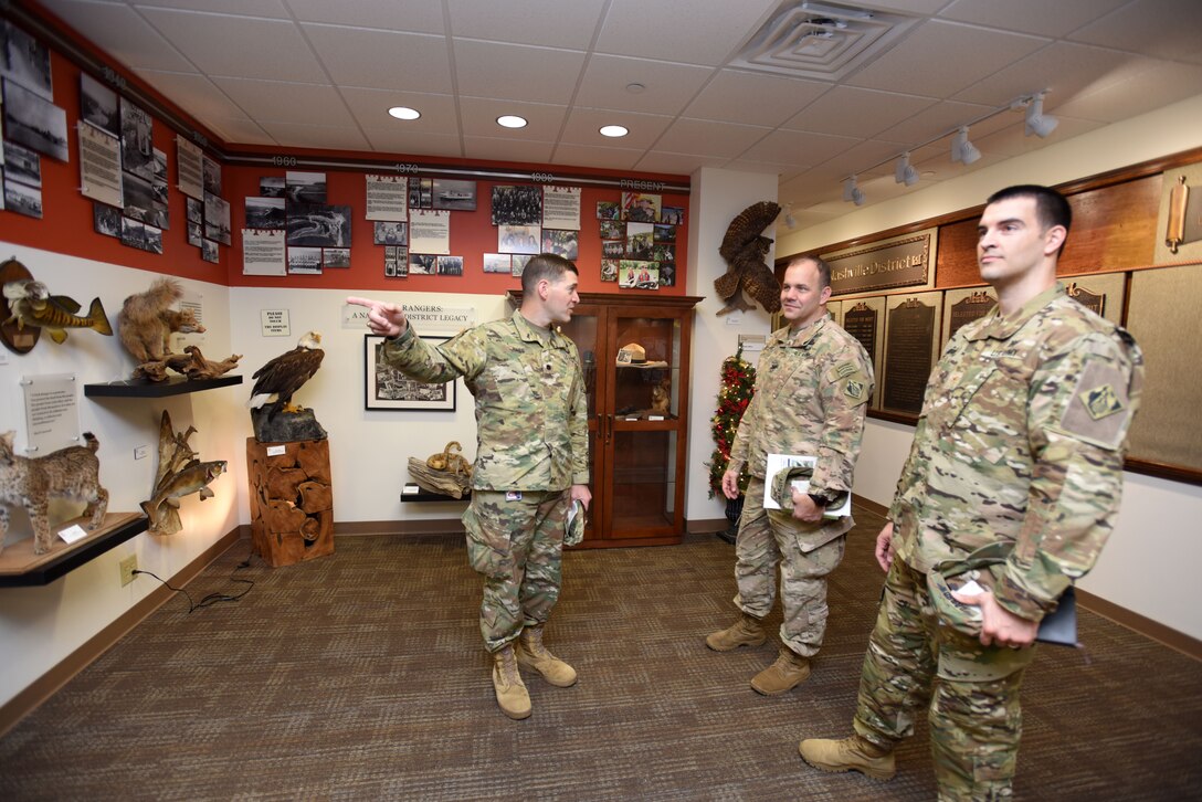 Lt. Col. Cullen Jones (Left), U.S. Army Corps of Engineers Nashville District commander; leads Col. Michael Ellicott Jr. (Middle), U.S. Army Corps of Engineers Memphis District commander and district engineer; and Maj. Thomas C. Darrow, Memphis District deputy commander; on a tour of the Nashville District Headquarters in Nashville, Tenn., Dec. 19, 2017. (USACE photo by Lee Roberts)