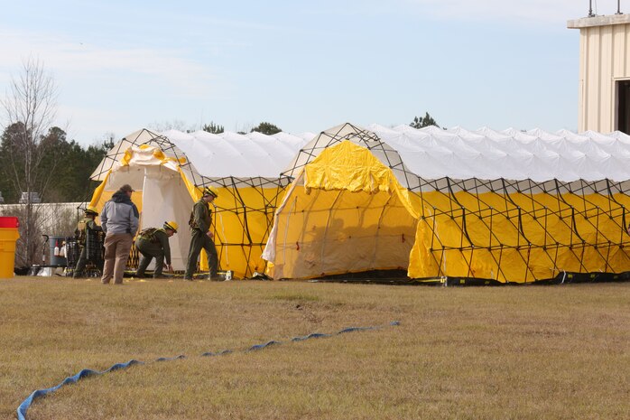 PERRY, Ga. – Decontamination Platoon and Identification and Detection Platoon with Chemical Biological Incident Response Force, CBIRF, U.S. Marine Corps Forces Command, executed Advanced Decontamination/ Identification and Detection Training at Guardian Centers, Perry, Ga., Dec. 11-14, 2017. During the week-long training the platoons refined their skills in setup and breakdown of decontamination sites, decontamination of role players, and identification and detection of known agents in several scenarios including mass casualty, radiation scenario and a subway scenario.  (Official USMC Photos by Staff Sgt. Santiago G. Colon Jr.)