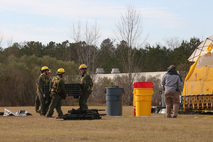 PERRY, Ga. – Decontamination Platoon and Identification and Detection Platoon with Chemical Biological Incident Response Force, CBIRF, U.S. Marine Corps Forces Command, executed Advanced Decontamination/ Identification and Detection Training at Guardian Centers, Perry, Ga., Dec. 11-14, 2017. During the week-long training the platoons refined their skills in setup and breakdown of decontamination sites, decontamination of role players, and identification and detection of known agents in several scenarios including mass casualty, radiation scenario and a subway scenario.  (Official USMC Photos by Staff Sgt. Santiago G. Colon Jr.)