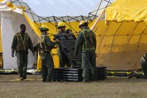PERRY, Ga. – Decontamination Platoon and Identification and Detection Platoon with Chemical Biological Incident Response Force, CBIRF, U.S. Marine Corps Forces Command, executed Advanced Decontamination/ Identification and Detection Training at Guardian Centers, Perry, Ga., Dec. 11-14, 2017. During the week-long training the platoons refined their skills in setup and breakdown of decontamination sites, decontamination of role players, and identification and detection of known agents in several scenarios including mass casualty, radiation scenario and a subway scenario.  (Official USMC Photos by Staff Sgt. Santiago G. Colon Jr.)